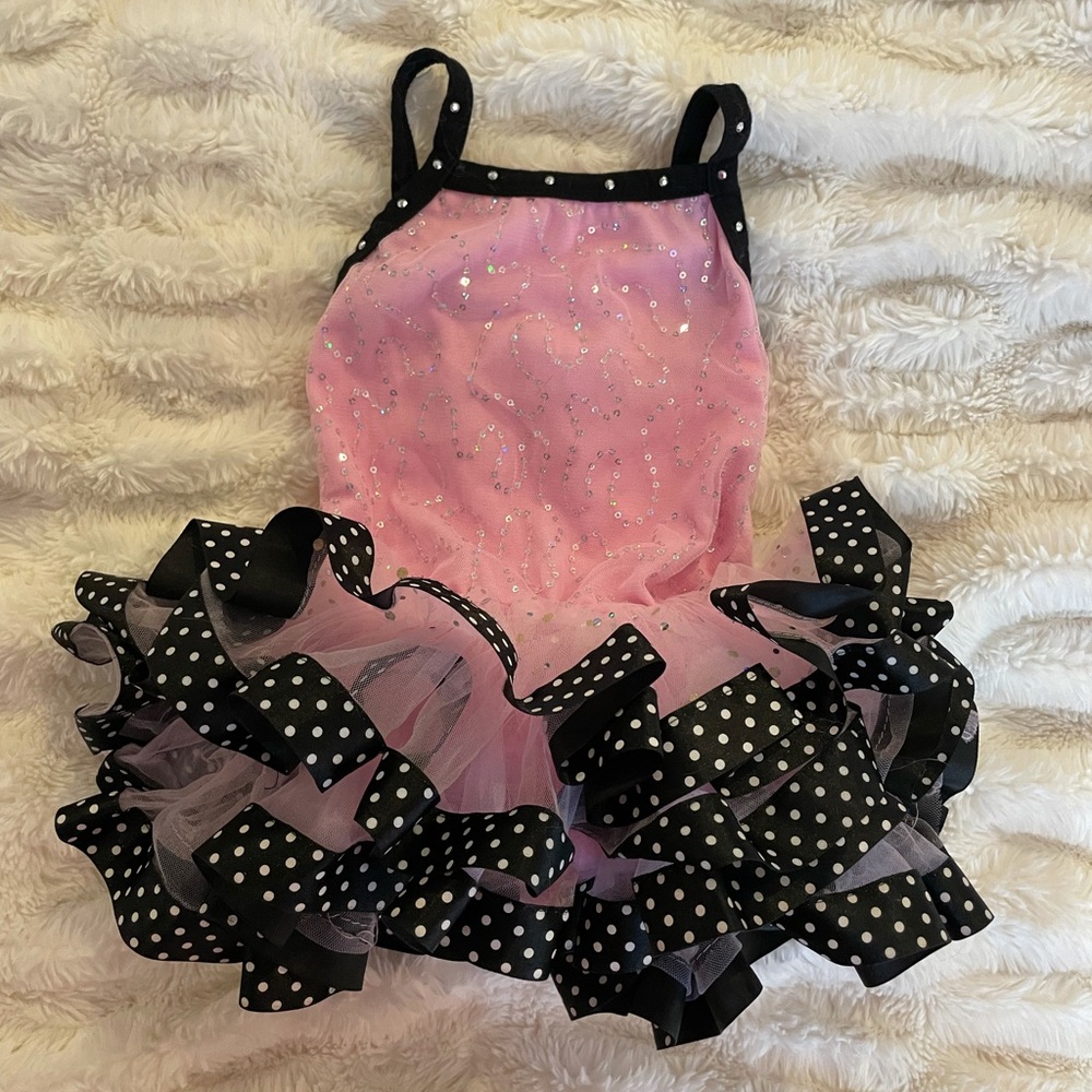 Pink sparkly leotard with black and white polkadot tutu